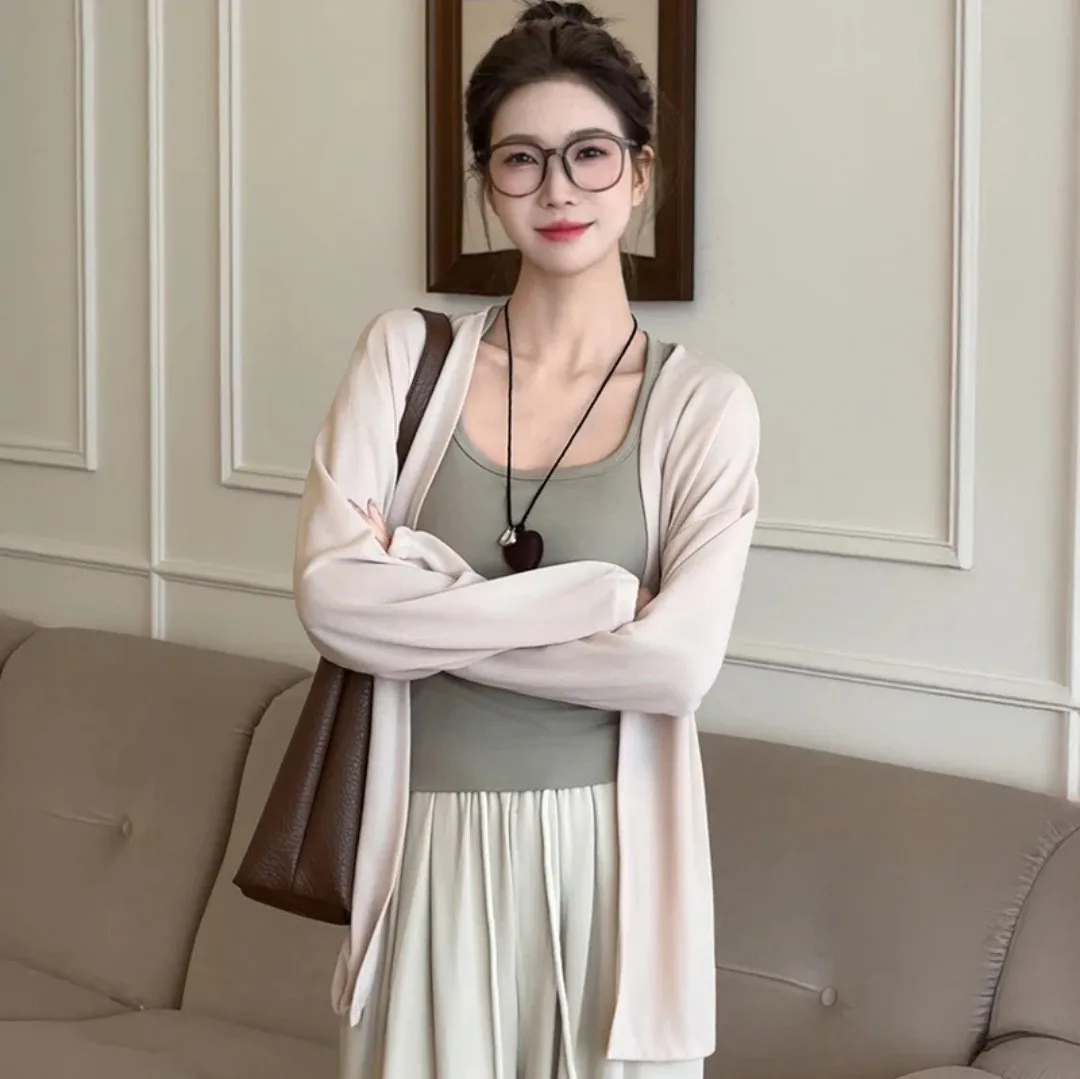 سترة نسائية محبوكة بأكمام طويلة خفيفة الوزن للربيع والصيف على الطراز الكوري فضفاضة تناسب الحماية من الشمس غطاء هوائي أنيق كاجوال