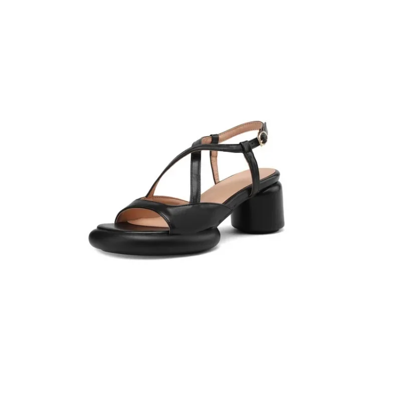 Minimally designed Thick heel sandals with a slim strap on the upper for  comfort   and   breathability