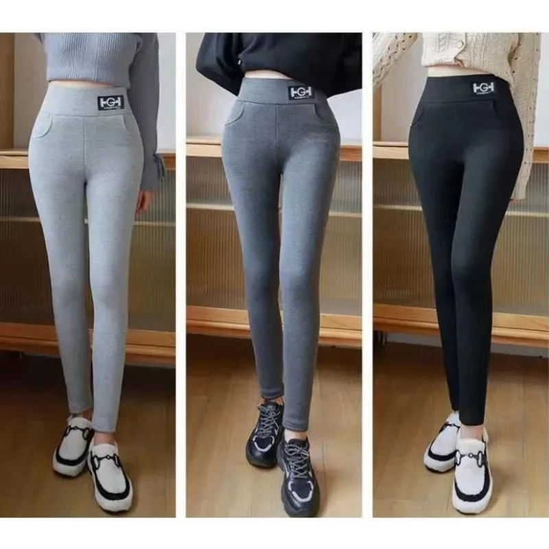 Inverno feminino leggings sólido quente leggings engrossar lã de cordeiro altura cintura velo manter bunda elevador alta elástica calças caminhada bolso