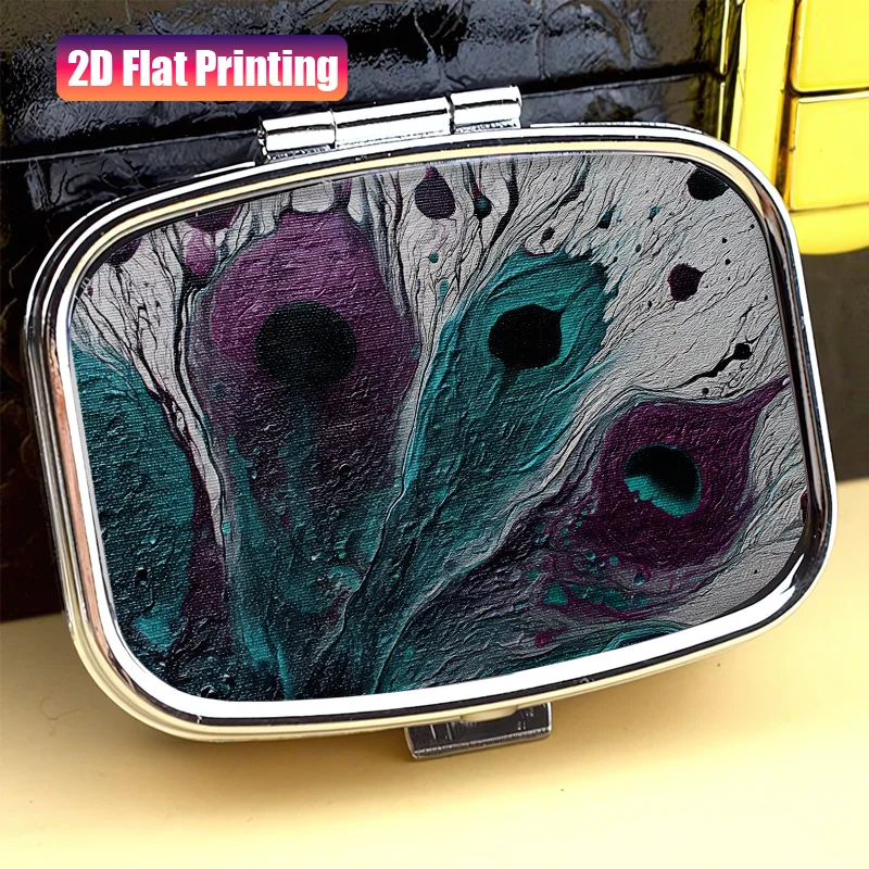 A flat-printed mini square pill box with compartments, earring storage box, dark green base with peacock feather pattern decoration, portable medicine storage box, suitable for travel and business trips, applicable for various occasions