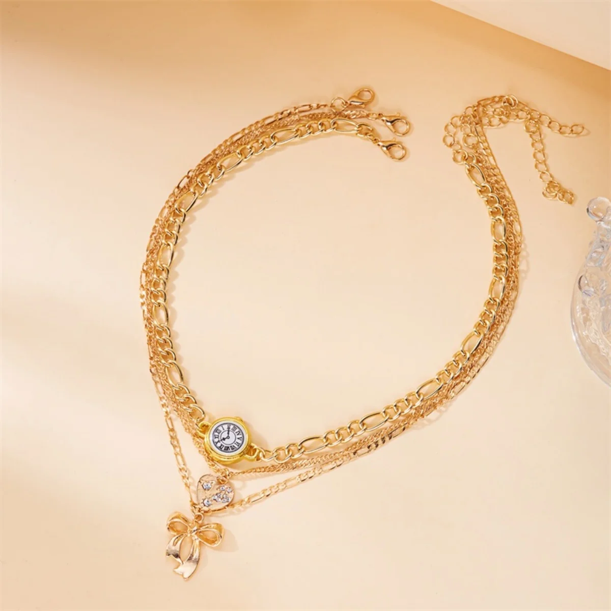 العصرية مطعمة حجر الراين Bowknot القلب ساعة على شكل قلادة قلادة أساور مجموعة للنساء الرجال لذيذ القوس مجموعة مجوهرات على شكل قلب