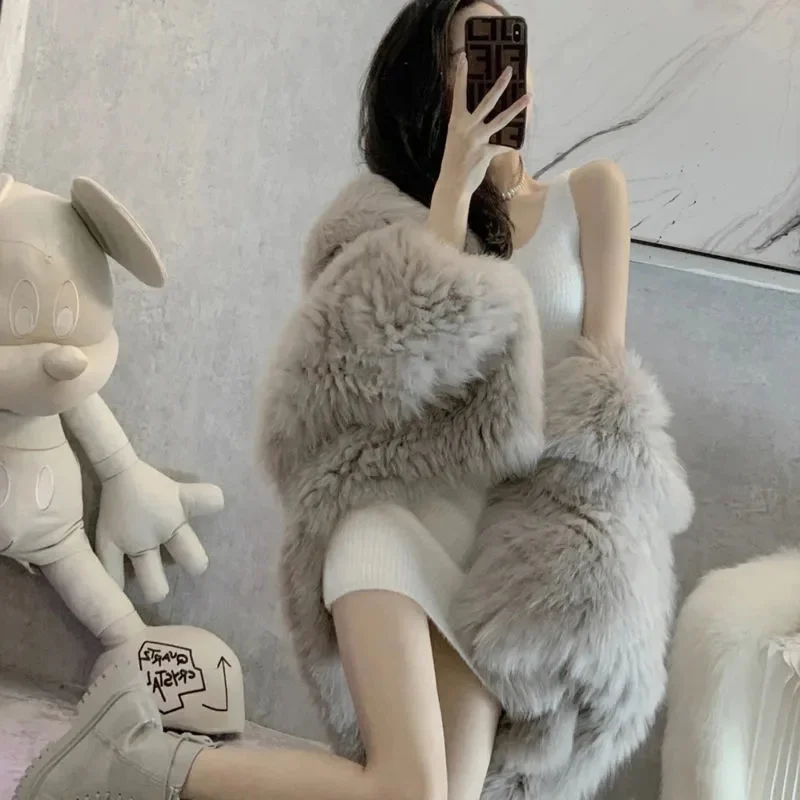 

2023 New Faux Fox Fur Coat Women's Loose Korean Fashion Loose Hooded Thickened Coats Female Faux Plush Fur Overcoat