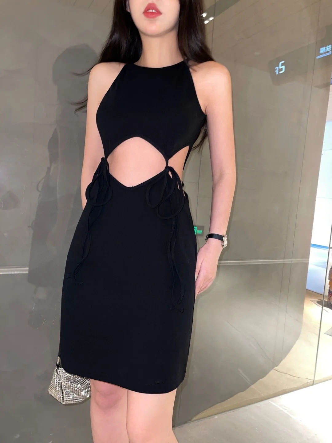 

Ln the summer of 2022 the new round sling off-the-shoulder black dress is a dewy pockets hip women cultivate ones morality dress