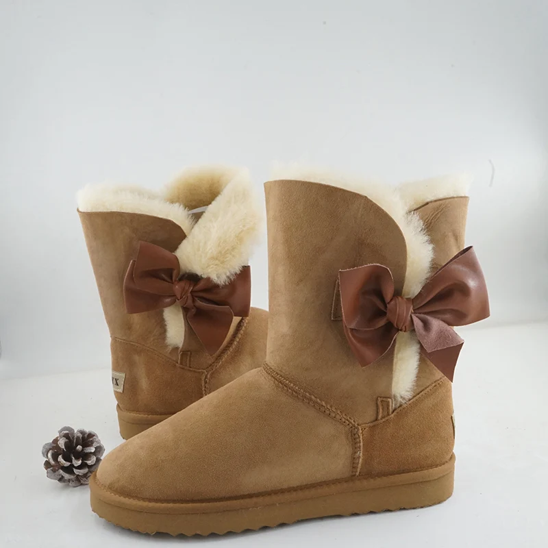 Moda laço botas de neve de pele natural novos sapatos femininos pele de carneiro genuína pele real 100% lã inverno meados de bezerro botas de neve