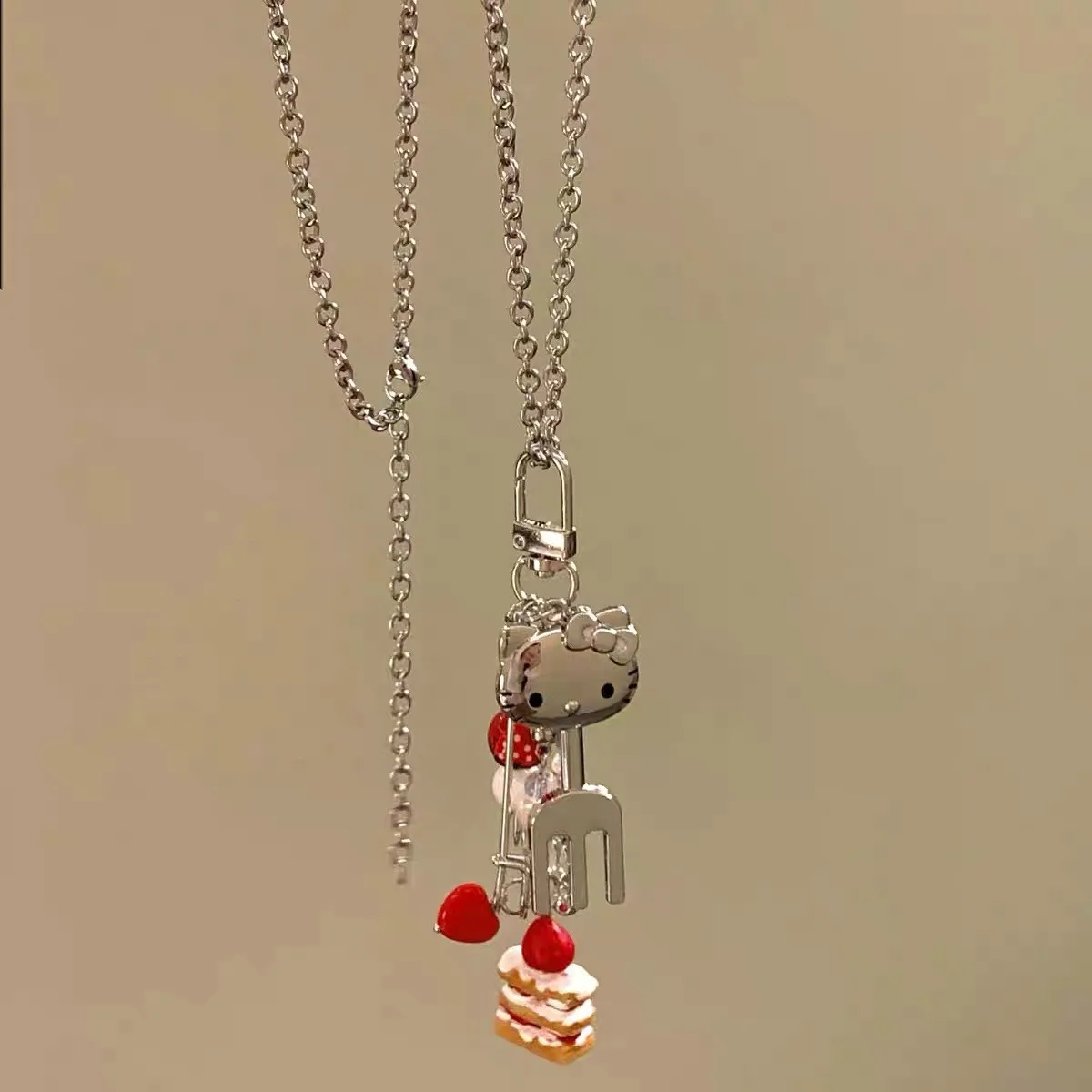 

2025 The New Sweet and Cool Cute Kt Cat Fork Cake Pendant Necklace Fashion Niche Design Personality Long Sweater Chain