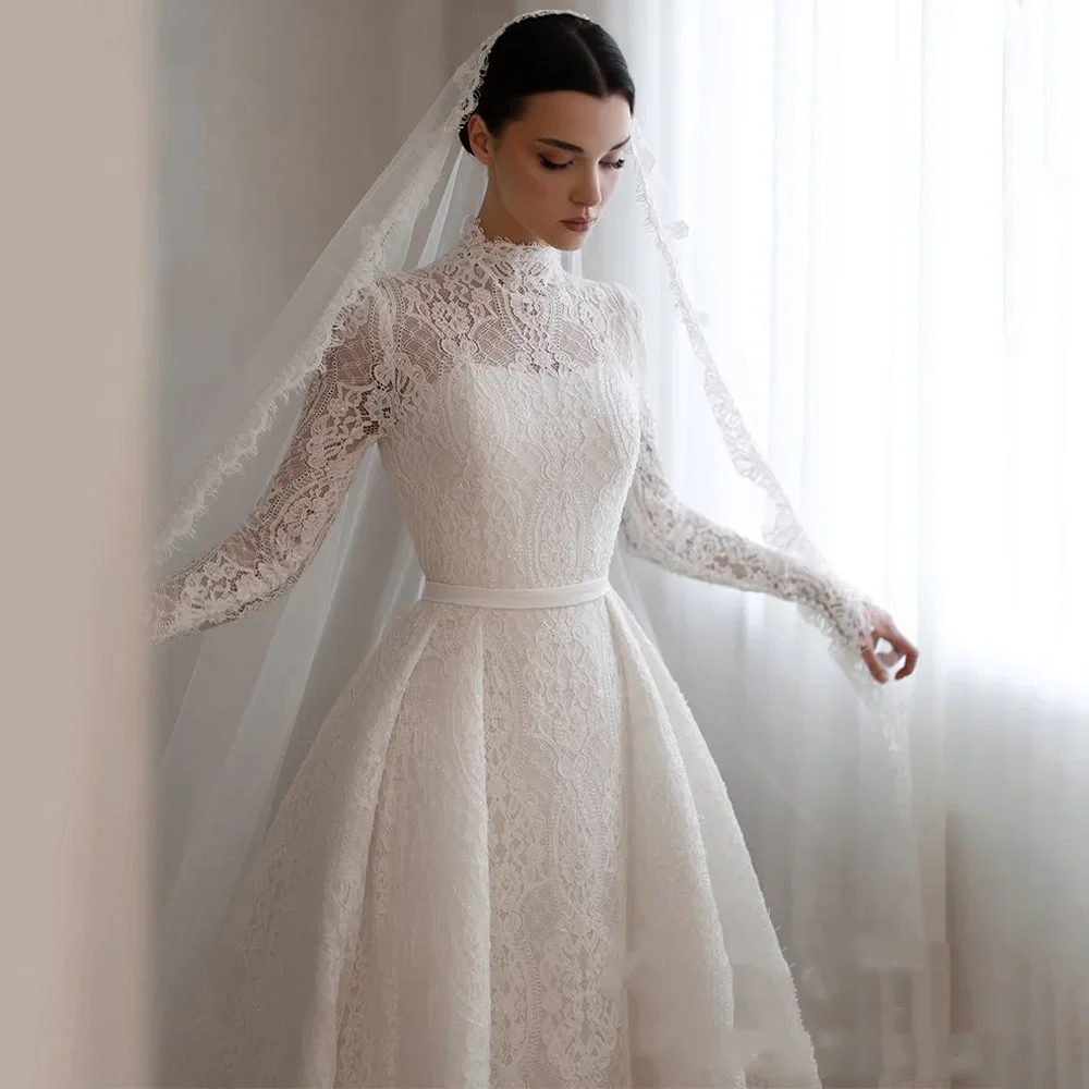 Abiti da sposa saud eleganti personalizzati Collo alto Maniche lunghe Corte dei treni Abito da sposa in pizzo arabo Una linea Vestido De Novia