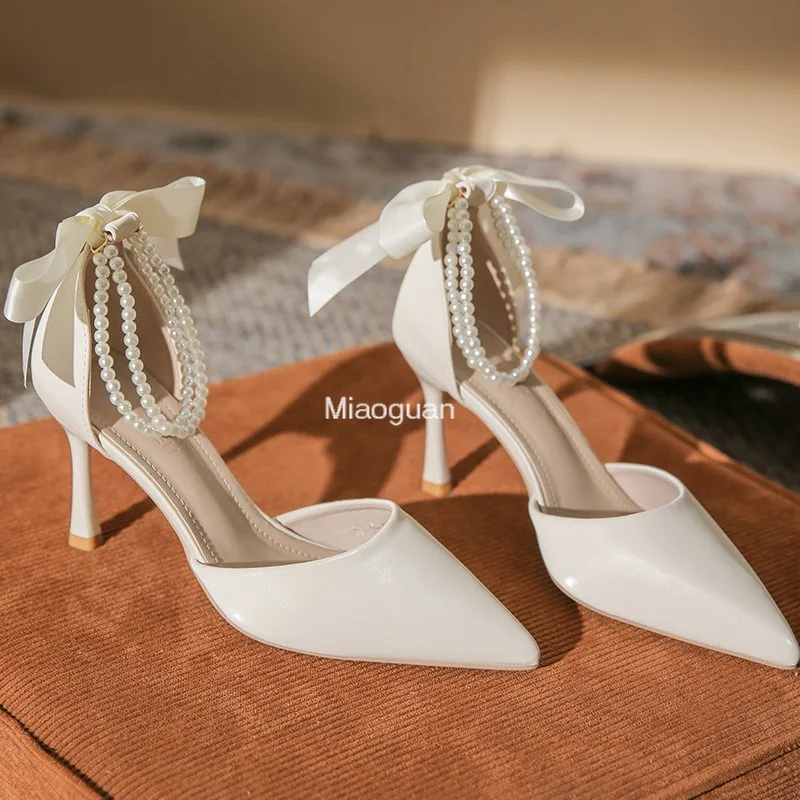 Décolleté in seta alla caviglia bianco perla Design 8cm tacchi alti décolleté da donna Stiletto Sexy con cinturino a fiocco abito da sposa scarpe da