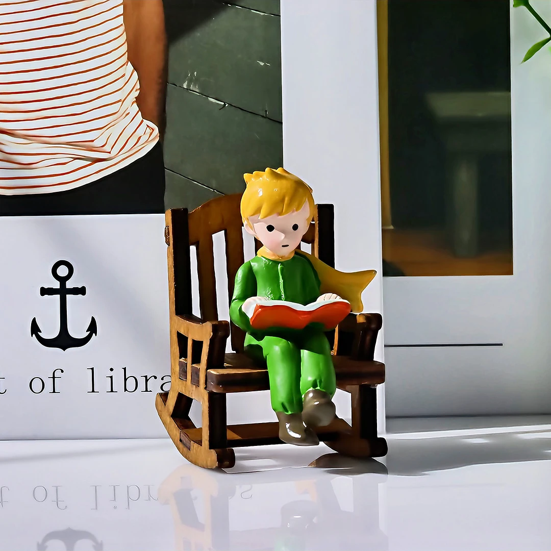 

Anime Home Decor Resin Little Prince Figurine Reading on Rocking Chair Fairy Tale Theme Home Decoration for Bedroom/Desk