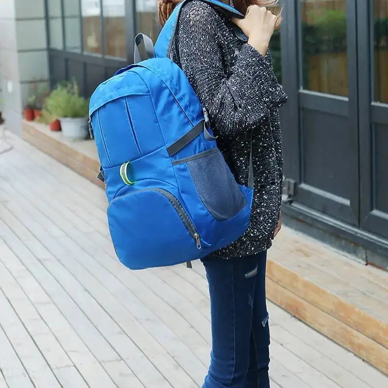 عارضة أزياء سعة كبيرة في الهواء الطلق حقيبة قابلة للطي المطبوعة كلمة حقيبة السفر حقيبة تسلق الجبال حقيبة ظهر قابلة للطي