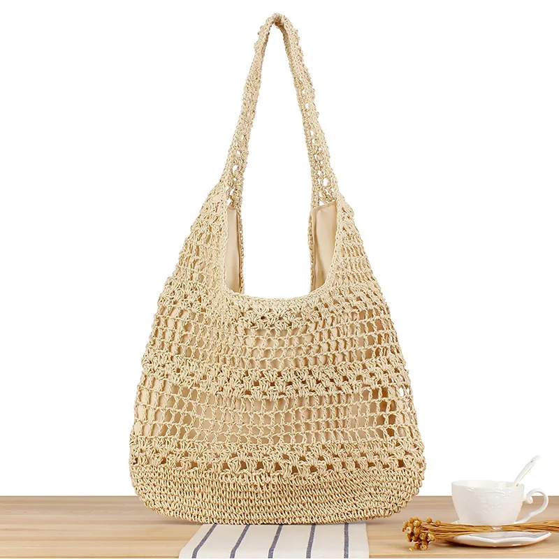 

2024 Spring/Summer New Tote Grass Handbag Single Shoulder Bag Hollow Women's Shopping Bag Straw Woven Bag