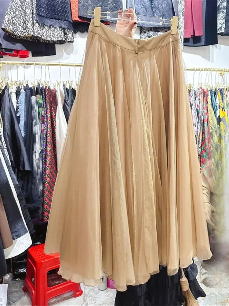 Spring 2024 New Women high waisted khaki half length skirt stylish irregular mesh skirt Office Lady Skirts Y4720