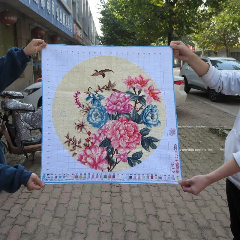 A handmade cross stitch finished product with peony flowers blooming, rich and noble, birds singing, and fragrant flowers. A new