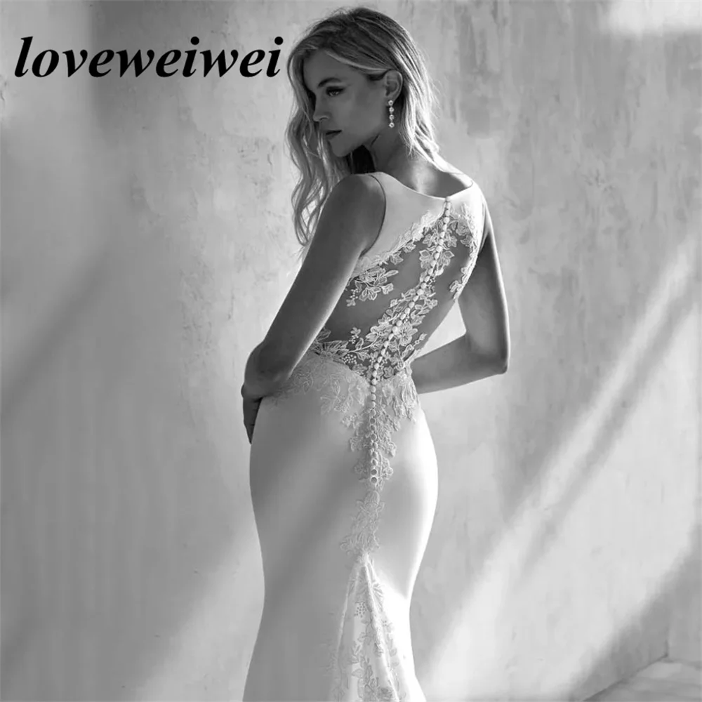 Boho V Neck Mermaid Wedding Dress Sexy Sleeveless Buttons Back Bride Gown Lace Appliques Sweep Train Robe de Mariée