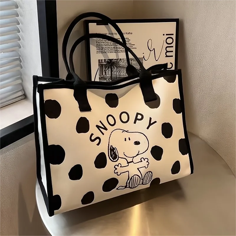 Ms. Snoopy\'s new fashionable and personalized cartoon print simple and versatile large-capacity one-shoulder portable canvas bag