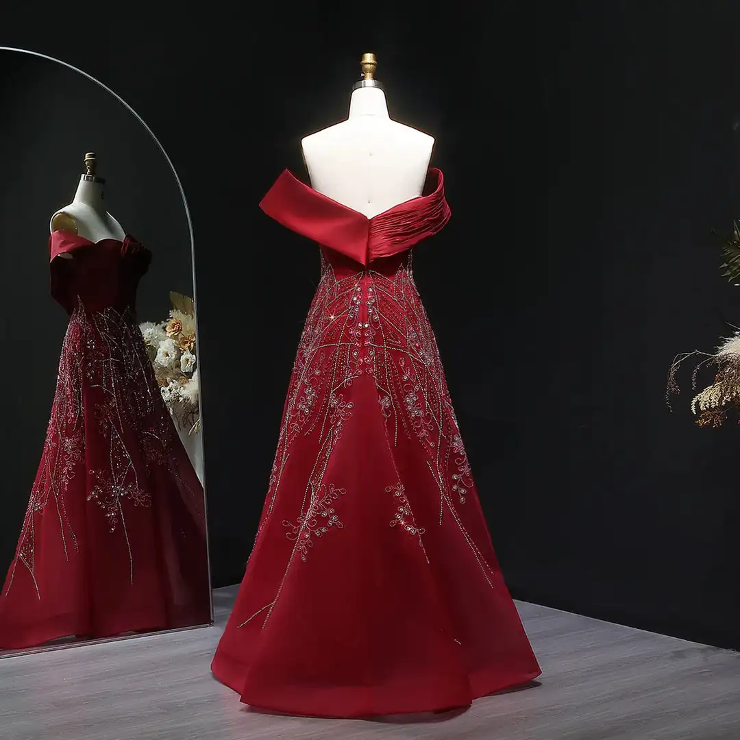 فساتين سهرة مطرزة باللون الأحمر بدون أكتاف من Jirocum مع قطار بتفاصيل فيونكة على شكل حرف A فساتين حفلات رسمية