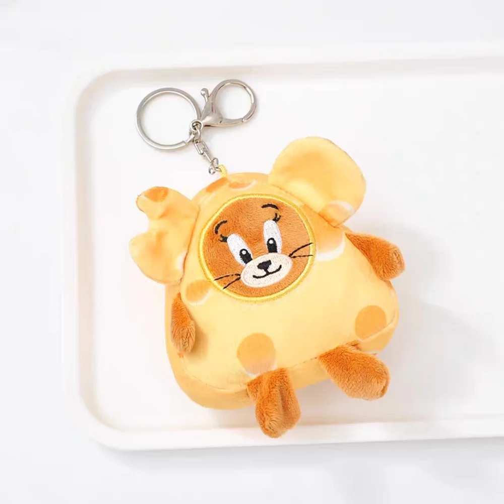 Kawaii ของแท้ Tom และ Jerry สามเหลี่ยมชีสตุ๊กตา Plush การ์ตูนผู้หญิงกระเป๋าเป้สะพายหลังตกแต่งตุ๊กตาอุปกรณ์เสริมของขวัญหญิง
