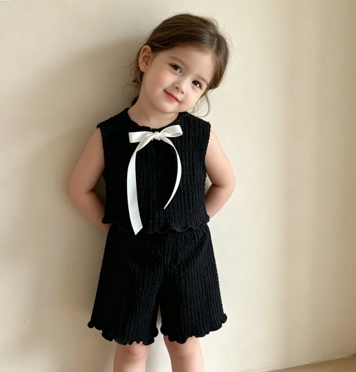 Conjunto Infantil Feminino 2026 Primavera/Verão Novo Vestuário Infantil para Meninas Bebês Algodão Fino Adorável Cor Sólida Colete com Laço e Calça Conjunto de Duas Peças