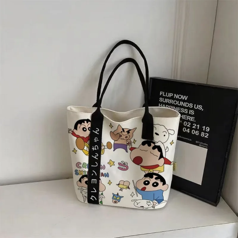 

Crayon Shinchan Children Canvas Bag Anime Character Student Commuter Handheld Cotton Bag Cute Bento Box Small Bag Birthday Gift
