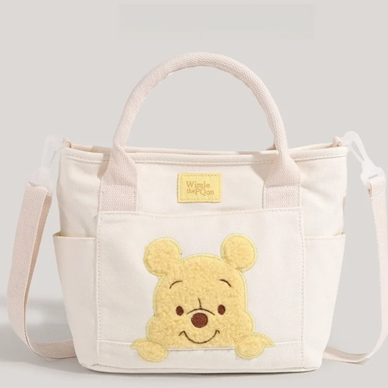 Disney Winnie the Pooh cartoon cute large capacity white canvas messenger bag women's casual wear-resistant shoulder handbag