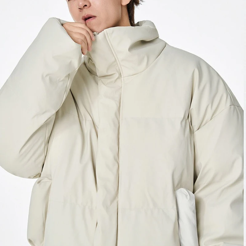 2025 Abrigo de algodón de color sólido corto y grueso cálido de invierno para hombre, chaqueta holgada informal a prueba de viento con cuello levantado.