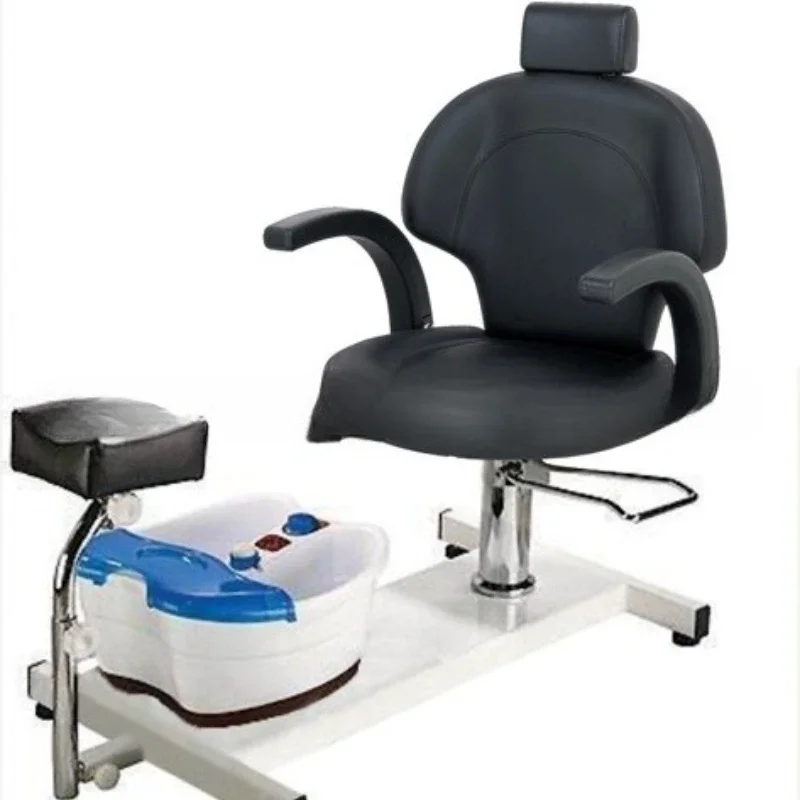 Black pedicure chair with electric massage basin and integrated chair basin