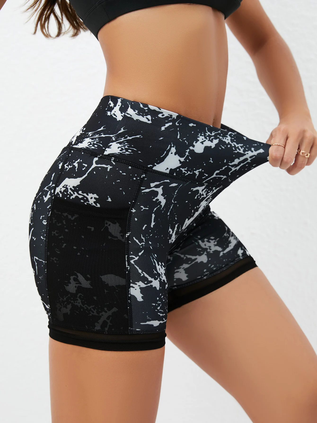 Women's high-waisted yoga shorts with pockets  Colorful graffiti print, perfect for running, cycling and fitness training Com
