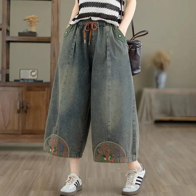 Pantalones vaqueros de pierna ancha para mujer, Vaqueros Retro lavados con bordado Vintage, cintura elástica, holgados hasta el tobillo, 2024