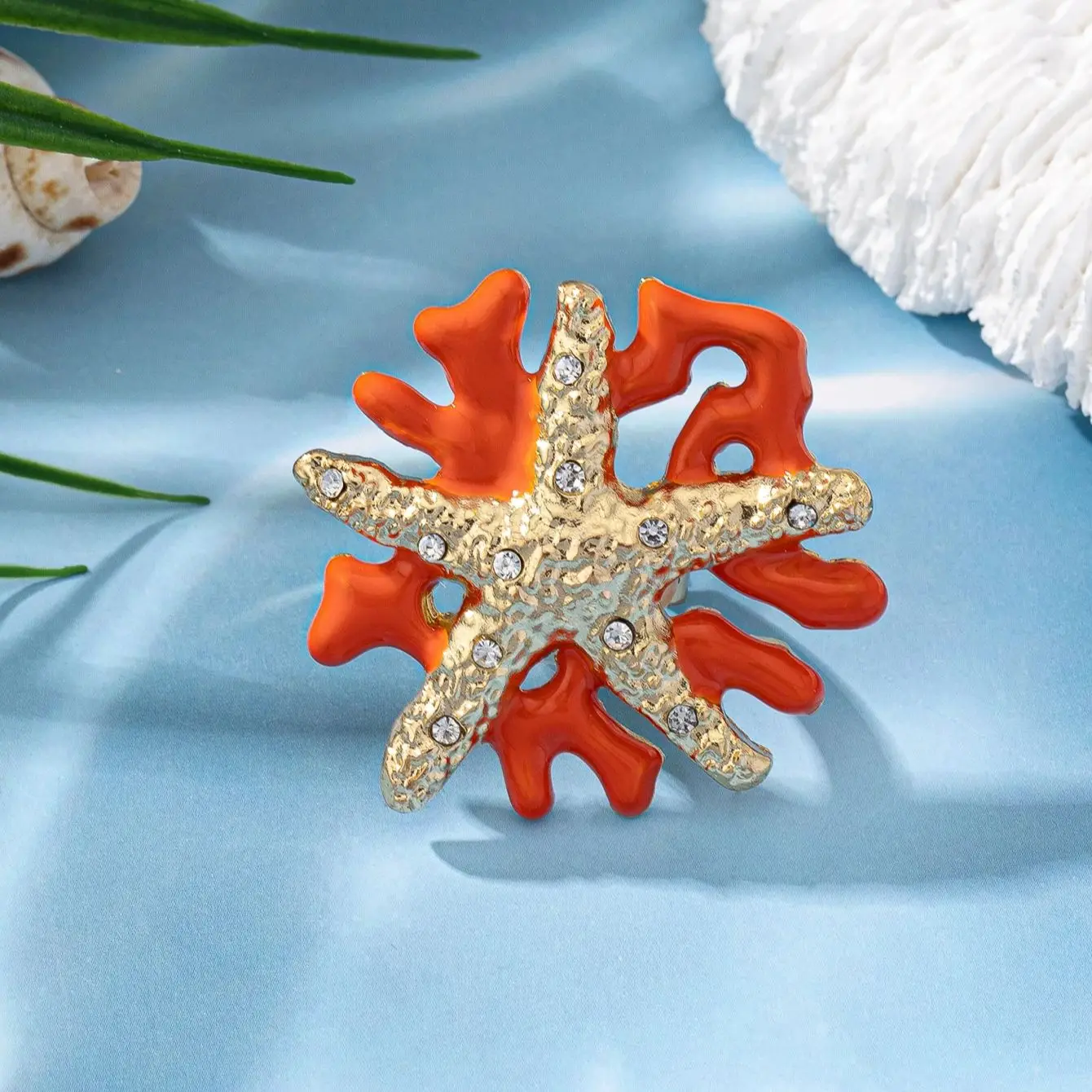 

Fashionable colorful oil drop coral, golden starfish ring, vacation travel jewelry