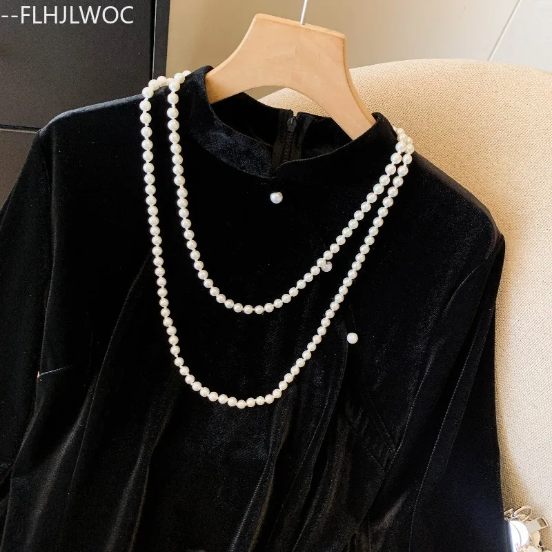 بلوزات مخملية سوداء على الطراز الصيني تشي باو بلوزات ذات ياقة ثابتة للعام الجديد 2026 قمصان كلاسيكية أنيقة للفتيات لربيع 2026