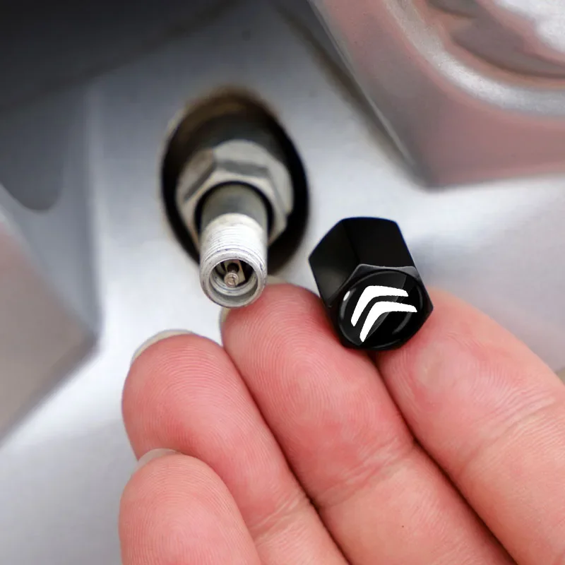 سيارة الإطارات صمام قبعات مع شارة السيارة كيرينغ المفاتيح اكسسوارات السيارات لسيتروين C1 C2 C3 C4 C5 C6 C8 C4L DS3 DS5