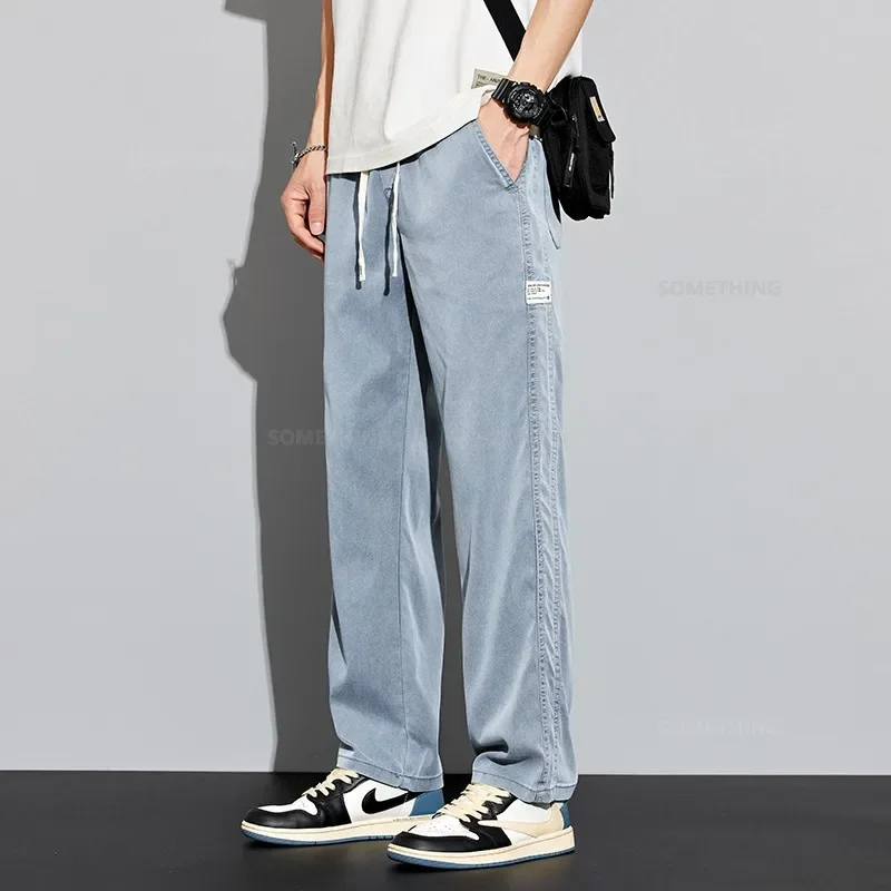 2024 New Men Soft Lyocell Pants Elastic Waist Drawstring Wide Trousers Baggy Straight Male Ice Silk Casual Pants Plus Size 4XL