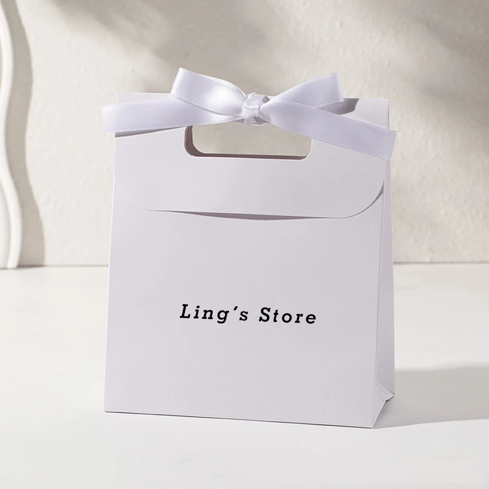 

50/100Pcs 14.5x15.5x7.5cm Jewelry Tote Bag Paper Wedding Favors Paper Bowknot Handle Pouch Personalized Logo Cosmetic Organizer