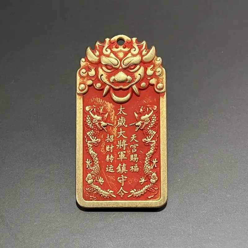 Antique cinnabar copper pendant featuring a tiger head general, Taoist talisman, and double brass dragon charm for personal wear