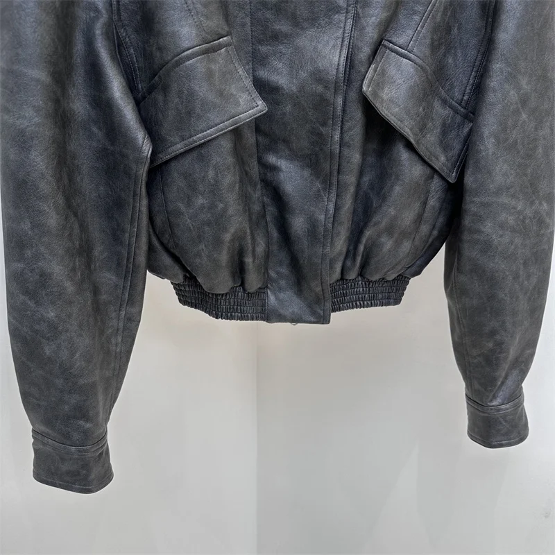 Chaqueta de cuero para mujer nueva chaqueta de motocicleta a prueba de viento con cuello levantado de invierno 2025 abrigo asimétrico de cuero Artificial para mujer