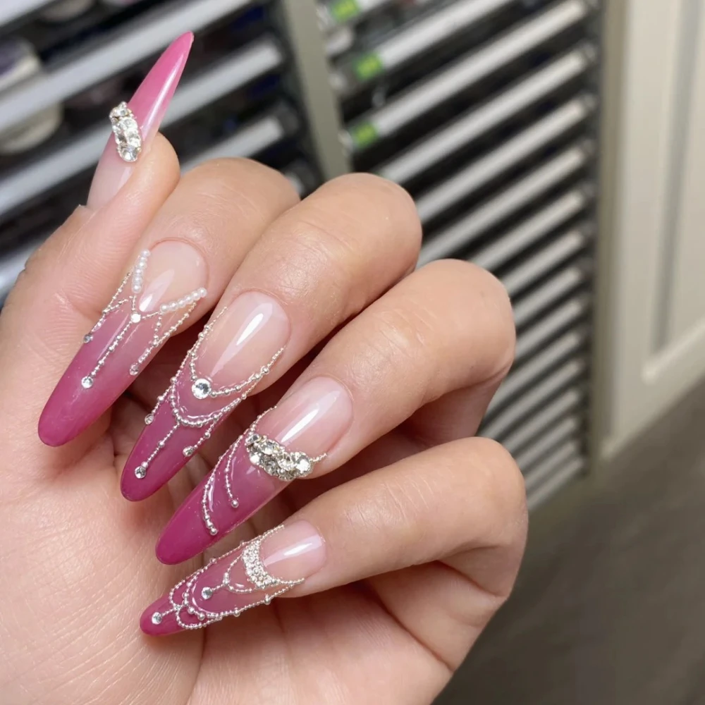 10 stuks handgemaakte manicure lange amandel nepnagels Franse roze Kerstmis en nieuwjaar beperkte nagels druk op nagels ontwerp met set