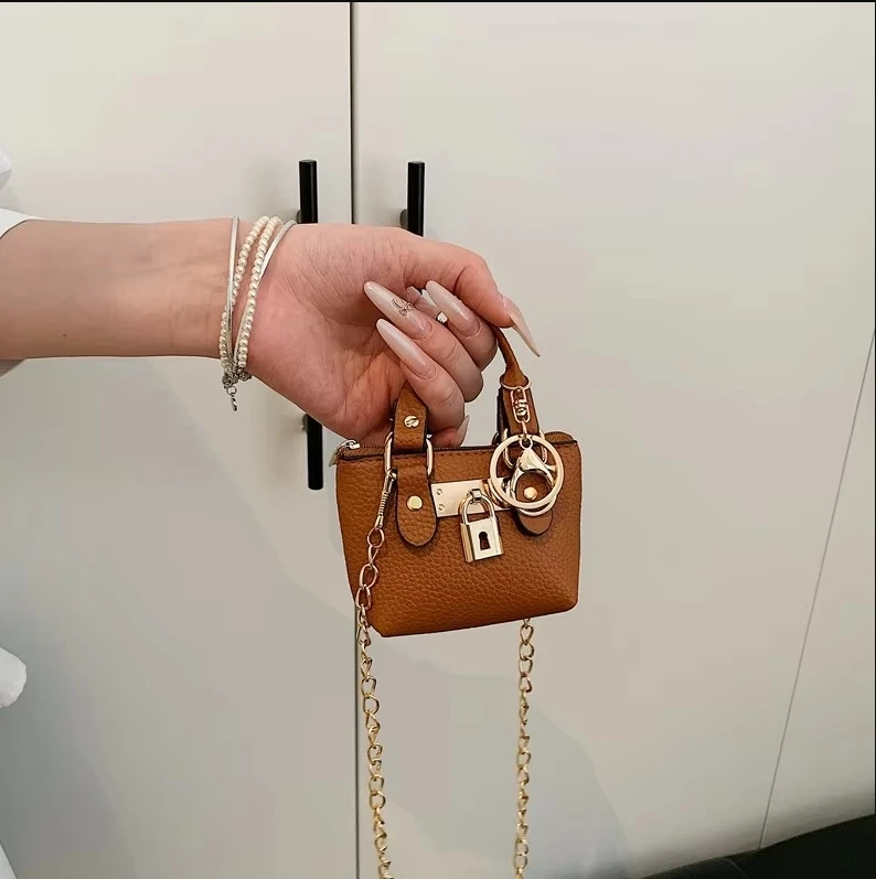 2026 Girls Hand-held Small Square Bag 2025 Summer New Classic Children Carrying One-shoulder Messenger Bag. Wallet Keychain