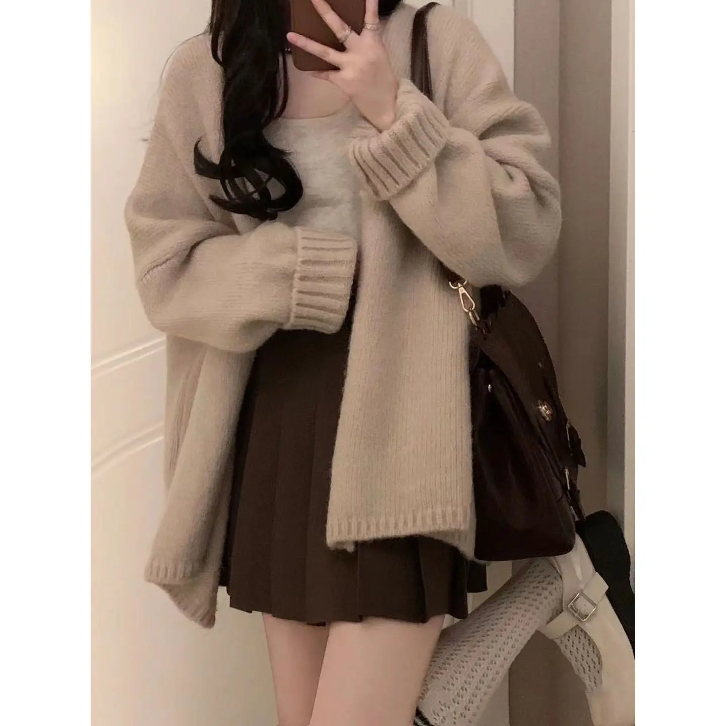 Spring Wear Female 2023 New Korean Version of The Hundred with Suspenders Loose Cardigan Thin Pleated Skirt Three-piece Set