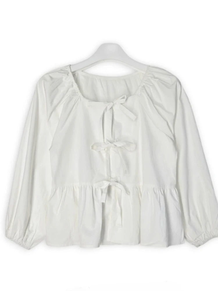 トレンドの半袖ロングシャツ レディース 春の新作 デザインセンス ボウタイ ルーズ バブルスリーブ ラウンドネック 無地シャツ