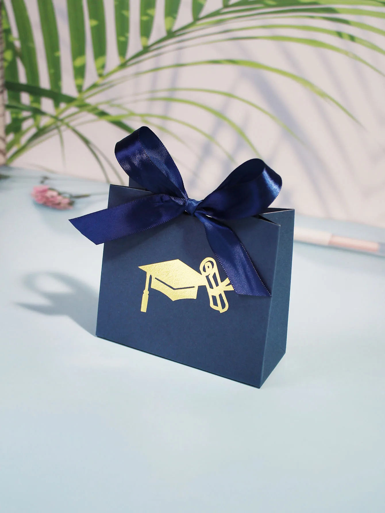 Elegant Navy Blue Graduation Gift Box with Gold Cap Design and Satin Ribbon - Perfect for Celebrating Educational Milestones