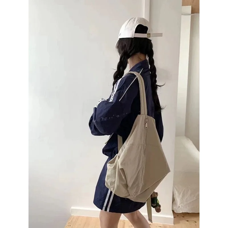 Korean version ins minority backpack female Backpack simple Literature and art Pupil Nylon fabric journey movement Gym bag