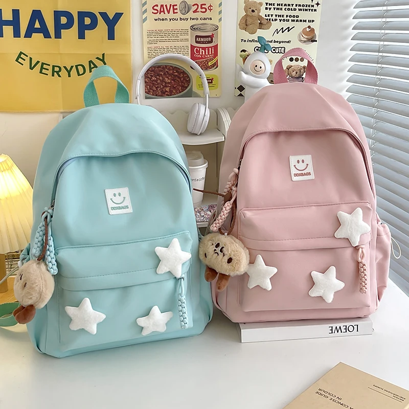 Cute Pink Backpack for Girls Fashionable Star Decorated School Bag with Plush Charm Ideal for Daily Use and School Cute Style Ba