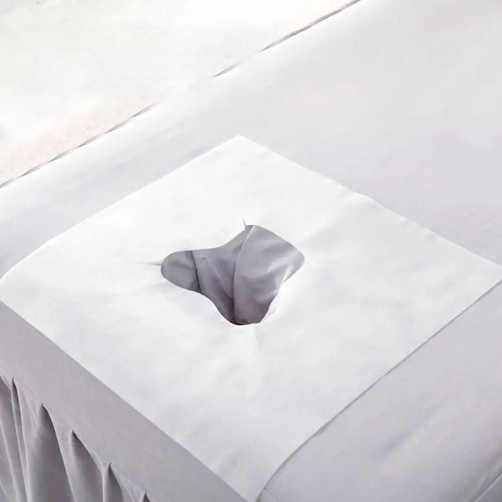 100PCS Usa E Getta Tavolo Da Massaggio Foro Asciugamano Bellezza Essenziale Addensare Tavolo Poggiatesta Coperture Tessuto Non tessuto Strumento di Trucco