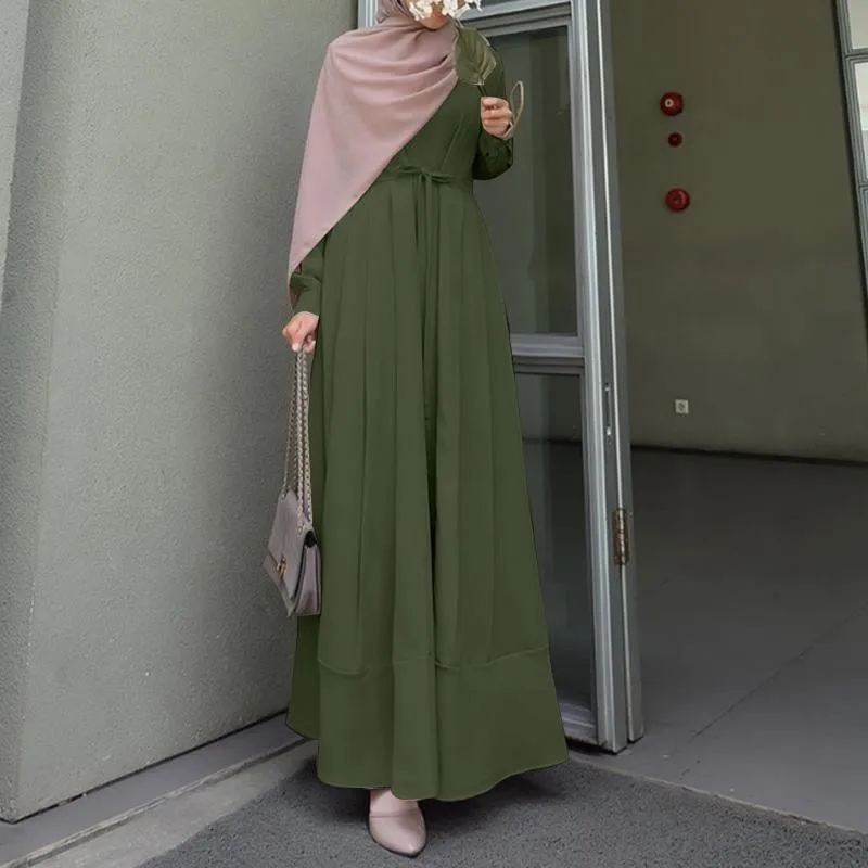 Islamic women Muslim style Arabic style solid color round neck long sleeved strap design lotus leaf hem when lining a dress