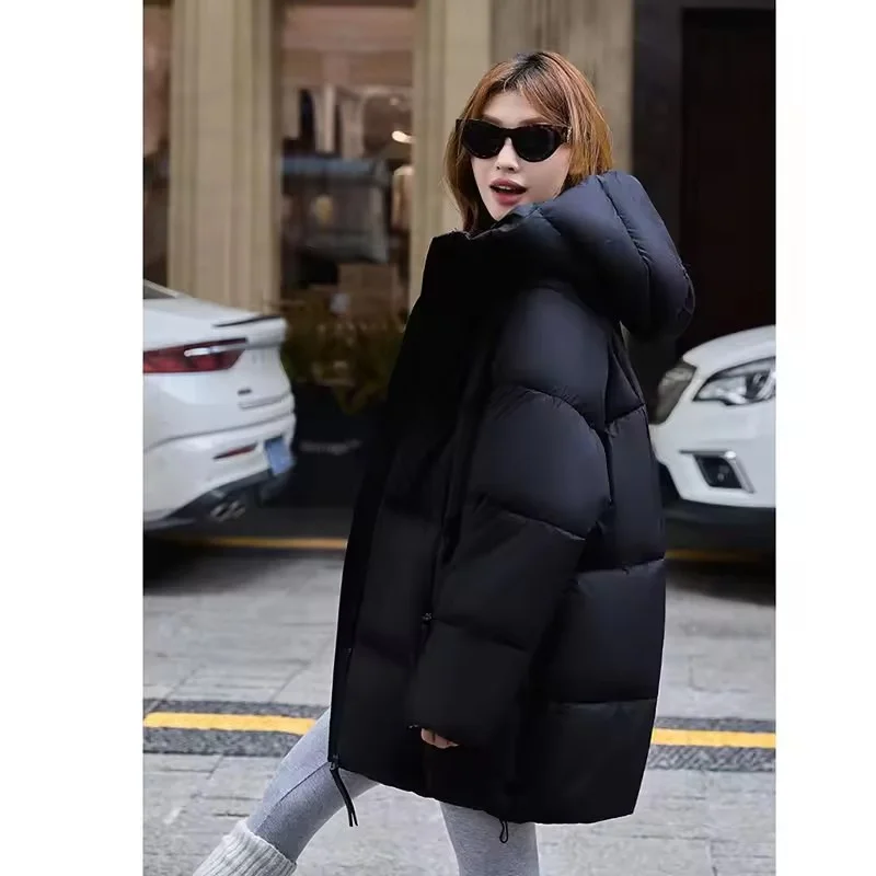 2025 invierno nuevo abrigo cálido para mujer Chaqueta larga de algodón con plumón moda con capucha mujer acolchado suelto Be All-Match ropa de abrigo de pan