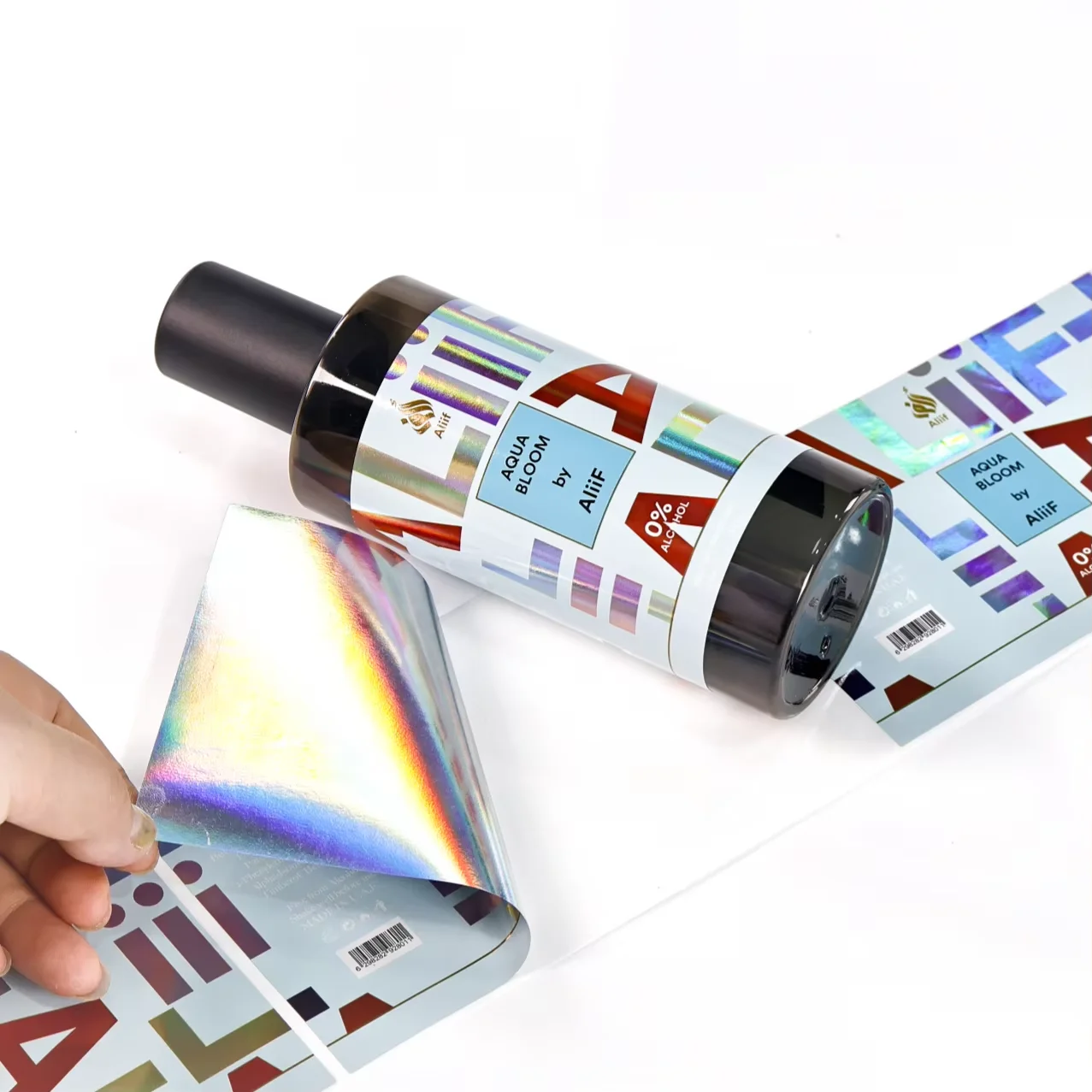 Etiquetas láser holográficas personalizadas | Acabado brillante | Pegatinas en rollo de fragancia premium