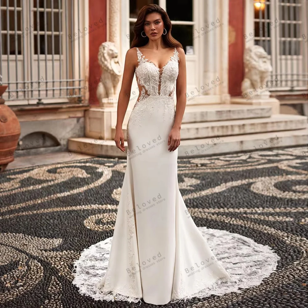 

Изысканные свадебные платья: роскошные, с кружевными аппликациями, без рукавов, с открытой спиной. Очаровательные платья для невесты на заказ.