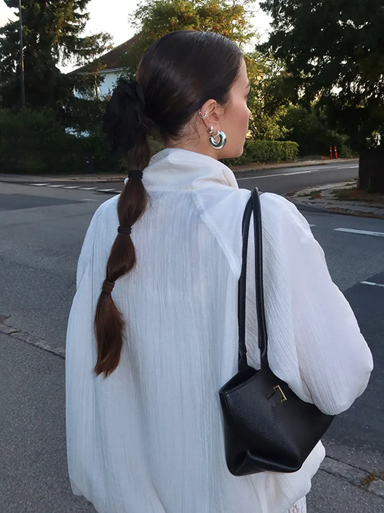 سترة قصيرة غير رسمية بياقة واقفة معاطف نسائية فضفاضة بأكمام طويلة وجيوب واحدة الصدر ملابس خارجية لخريف 2025 للسيدات في الشارع