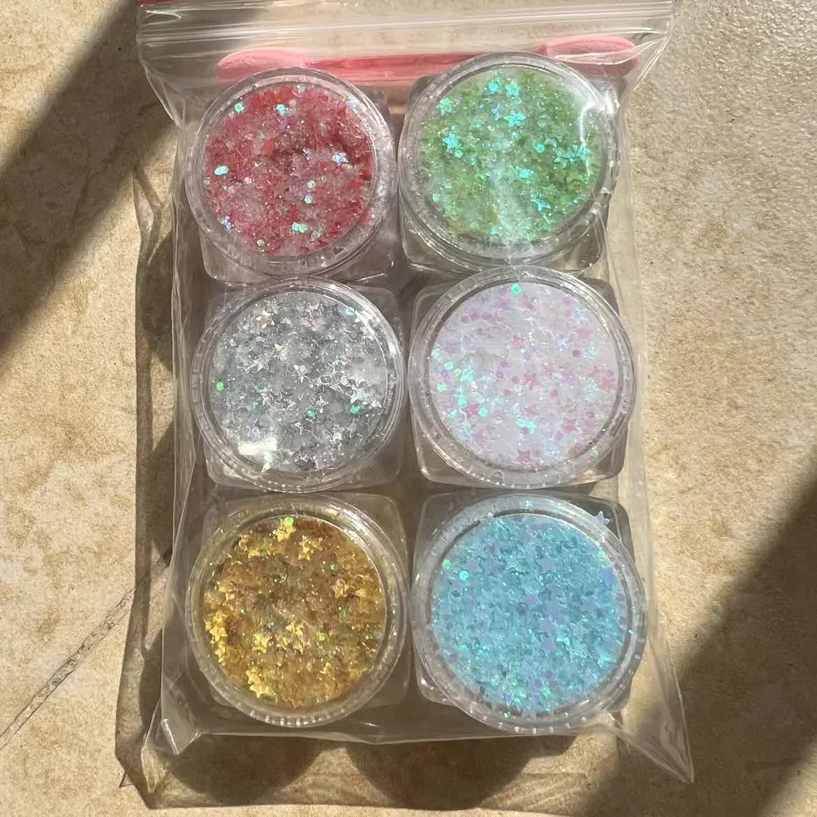 เจลกลิตเตอร์สำหรับผม ผิวกาย และใบหน้า กลิตเตอร์เนื้อครีมแบบฝุ่น กลิตเตอร์เมอร์เมด กลิตเตอร์เพชร กลิตเตอร์สำหรับแต่งตาแบบเจล พาเลทอายแชโดว์กลิตเตอร์