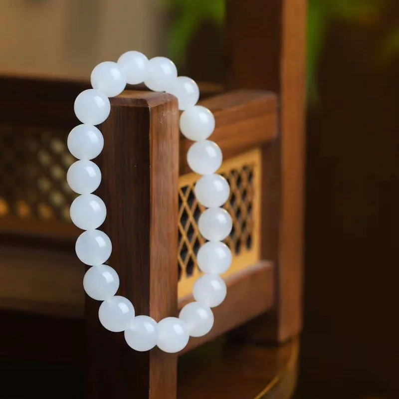 

Natural Hetian Qinghai Material Sheep Fat Grade White Round Jade Smooth Beads Bracelet