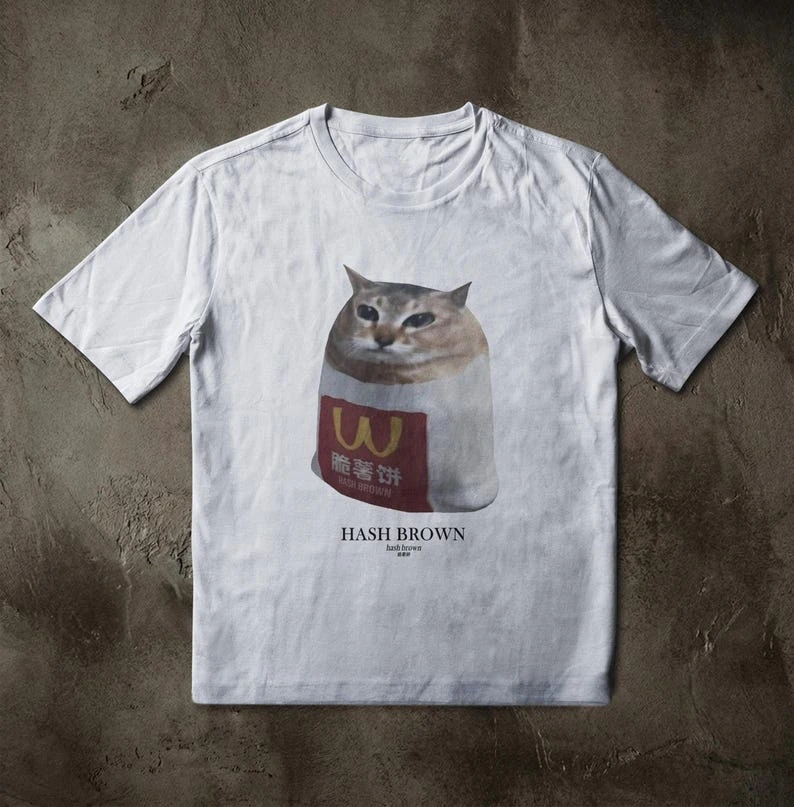 Potato Pancake Cat emoji T-shirt, quirky internet humor top, fast food parody; loose-fitting casual unisex streetwear shirt